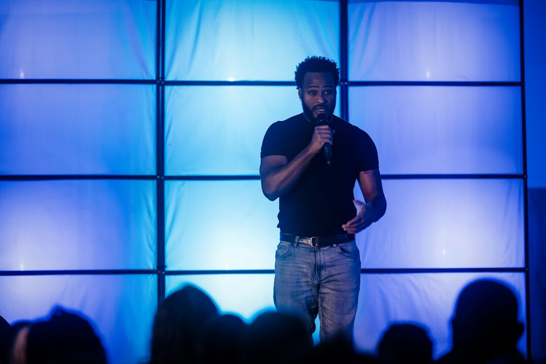 confident speaker on stage