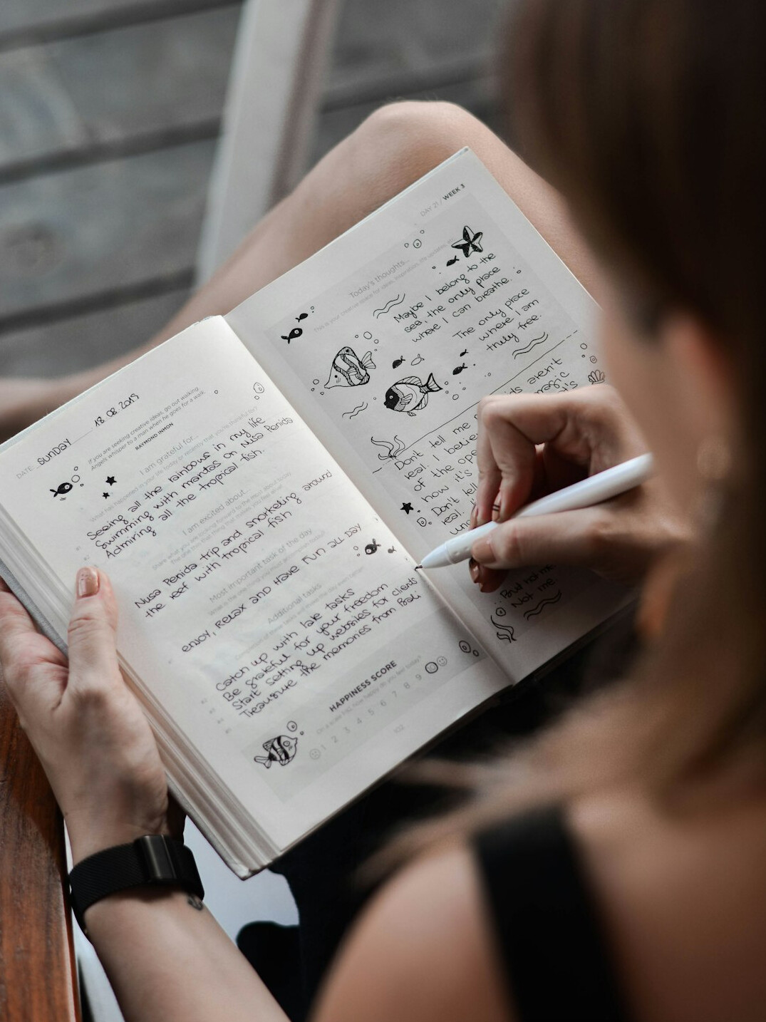 person journaling emotions