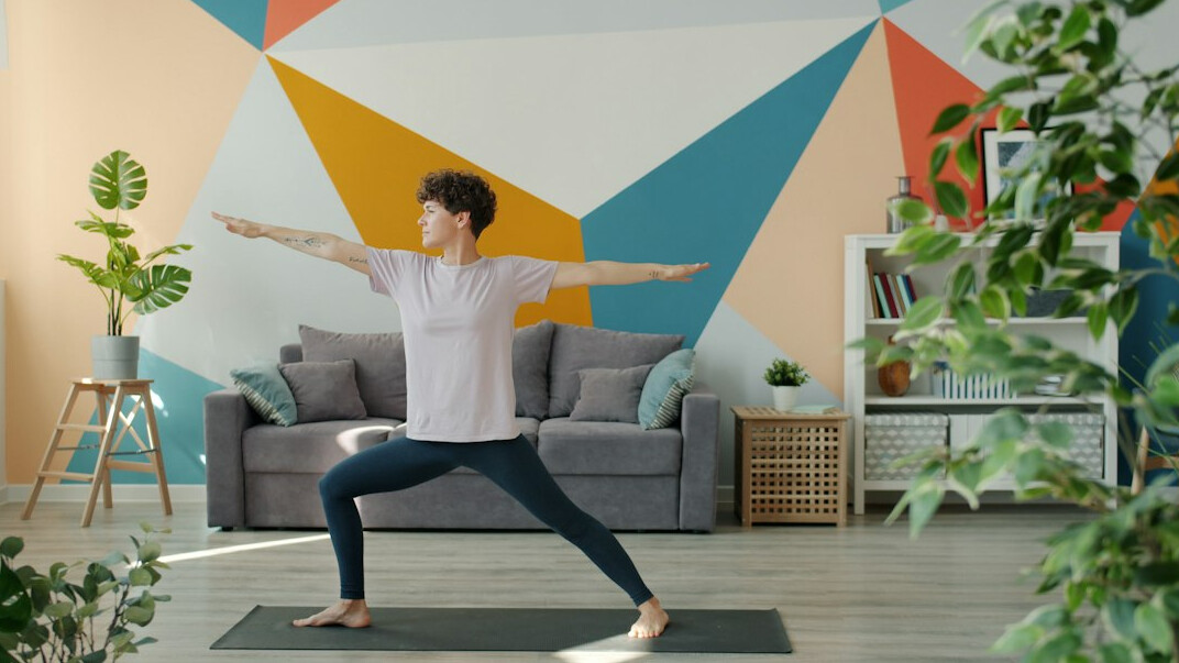 person doing yoga at home