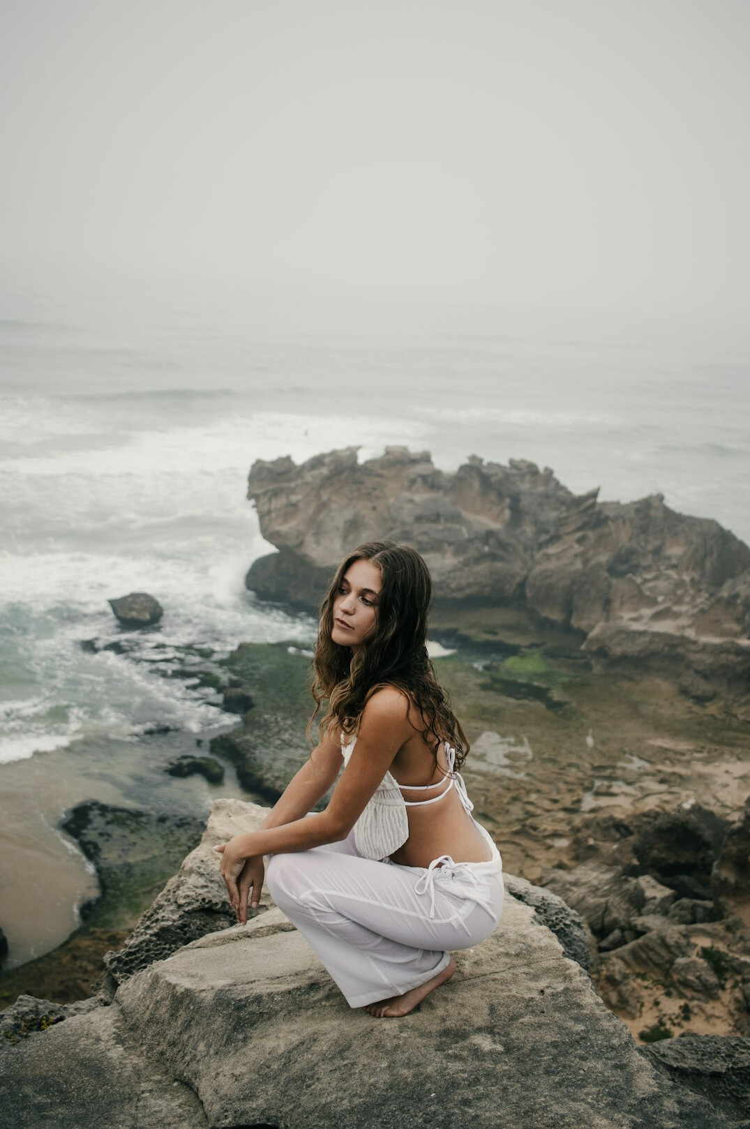 person meditating in nature