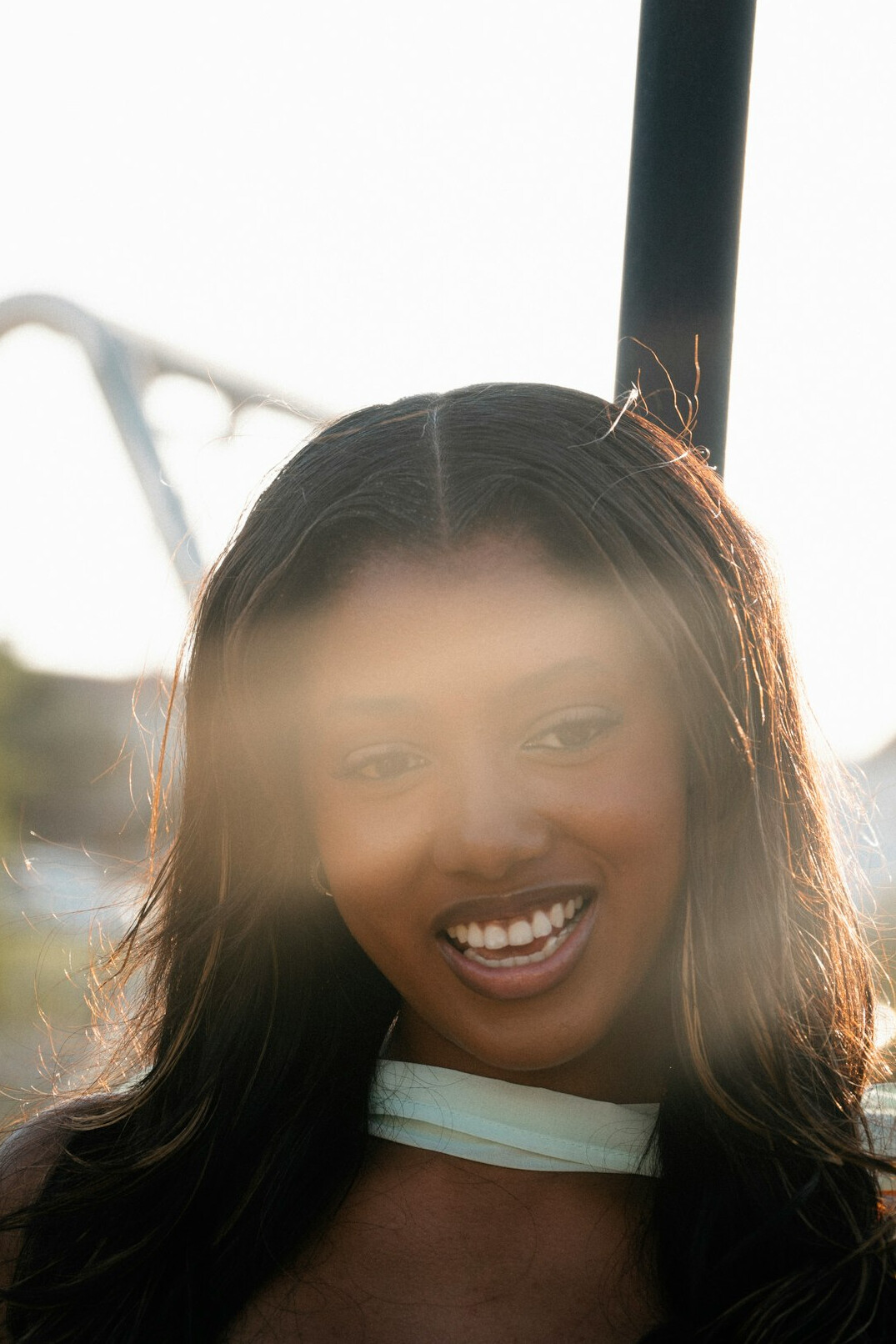 Brazilian woman smiling confidently in natural light